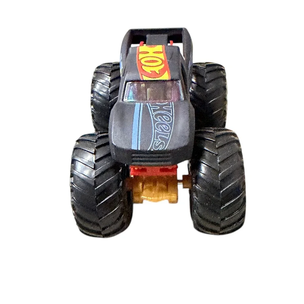 Hot Wheels Monster Trucks Matte Black Red Gold 1:64 Scale Die-Cast Toy Truck